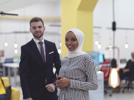 multiethnic startup business people team portrait at modern coworking open space office group of employees working in background