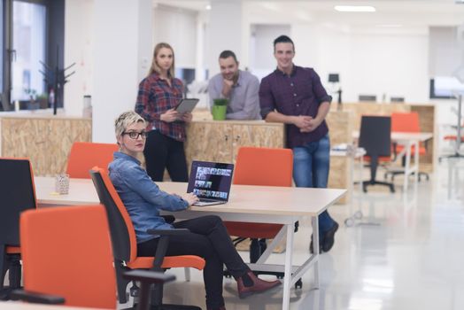 portrait of creative business people group in modern startup office interior