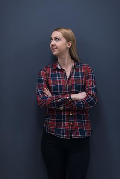 portrait of young startup business woman at modern office, grey chalkboard wall in background