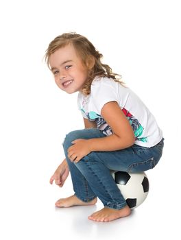 Cute little girl with beautiful grey eyes . Sitting on the ball - Isolated on white background