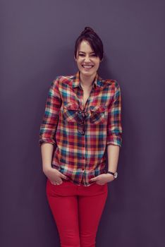 portrait of young startup business woman at modern office, grey chalkboard wall in background