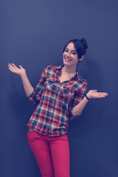 portrait of young startup business woman at modern office, grey chalkboard wall in background