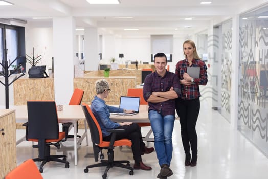 portrait of creative business people group in modern startup office interior