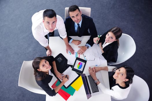 Group of happy young  business people in a meeting at office