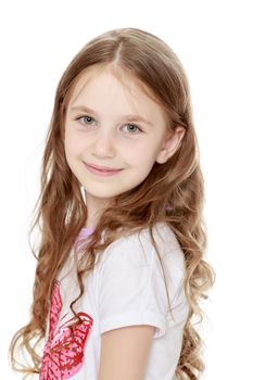 Beautiful little girl with long brown hair to her waist . The girl smiles sweetly turning sideways to the camera. Close-up - Isolated on white background