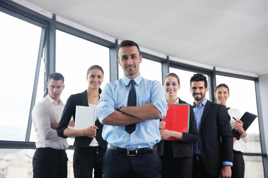 Group of happy young  business people in a meeting at office