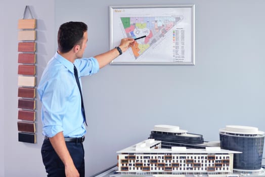 happy young business  man work in modern office on computer