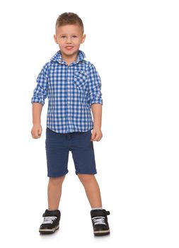 Nice little boy in shirt and shorts looking straight at the camera - Isolated on white background