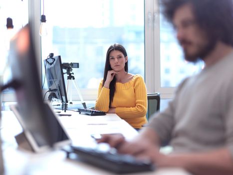 business woman have online meeting  in modern open space coworking office as influencer making podcat or tutorial videos