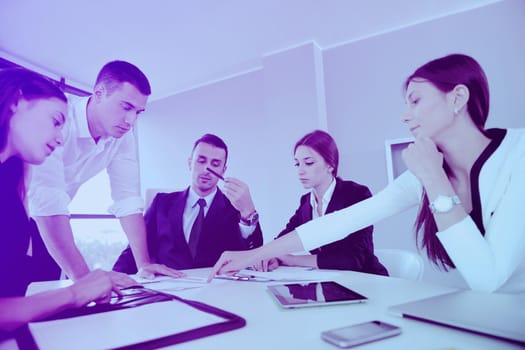 Group of happy young  business people in a meeting at office