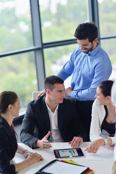 Group of happy young  business people in a meeting at office