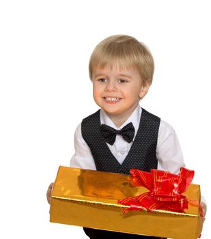 Cute little boy in white shirt, vest and tie ,holding a box with a gift - Isolated on white background