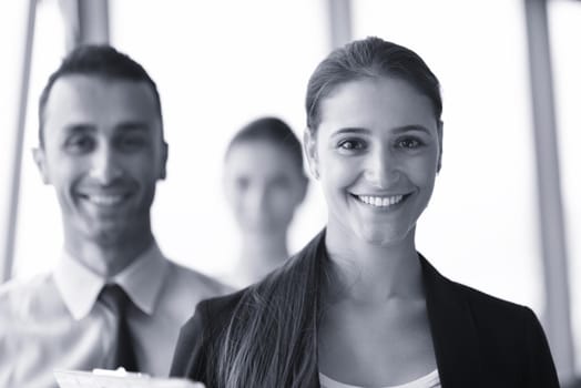 Group of happy young  business people in a meeting at office