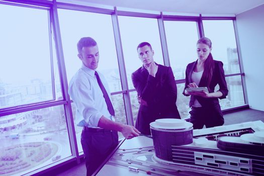 Group of happy young  business people in a meeting at office