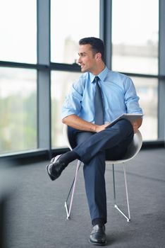 happy young business  man work in modern office on computer