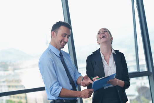 Group of happy young  business people in a meeting at office