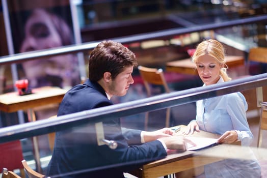 Group of happy young  business people in a meeting at office