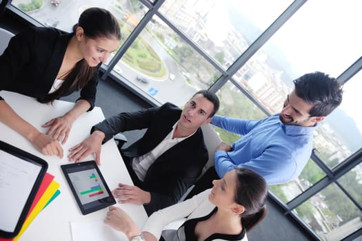 Group of happy young  business people in a meeting at office