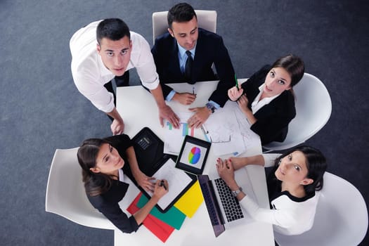 Group of happy young  business people in a meeting at office