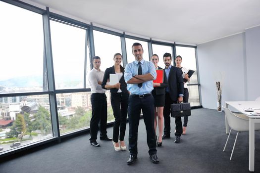 Group of happy young  business people in a meeting at office