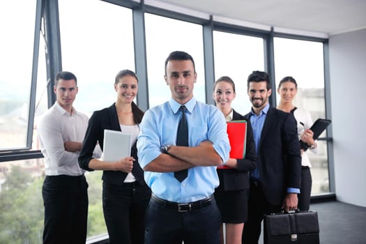 Group of happy young  business people in a meeting at office