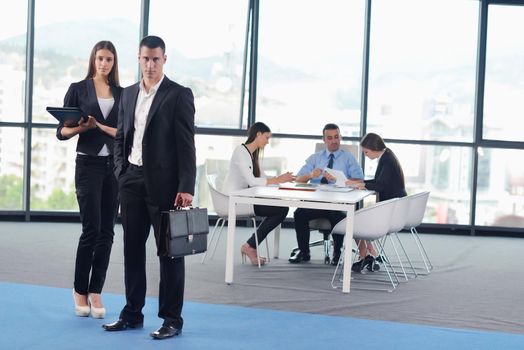 Group of happy young  business people in a meeting at office