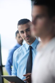 close-up of human hand  business man using tablet compuer at office