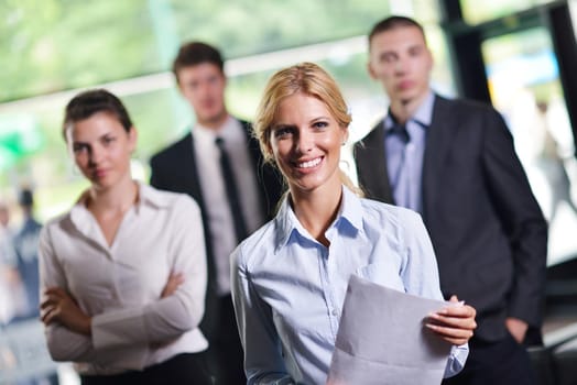 Group of happy young  business people in a meeting at office