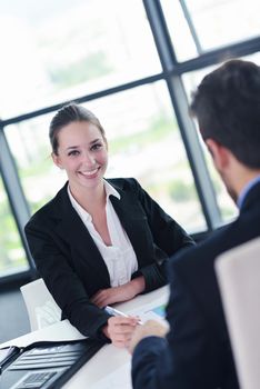 Group of happy young  business people in a meeting at office