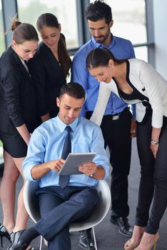 Group of happy young  business people in a meeting at office