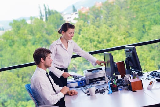 Group of happy young  business people in a meeting at office