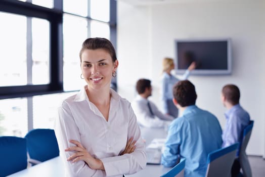 Group of happy young  business people in a meeting at office