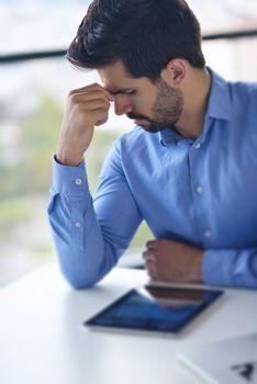 happy young business  man work in modern office on computer