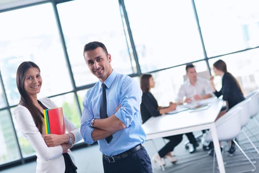 Group of happy young  business people in a meeting at office