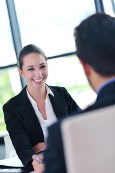 Group of happy young  business people in a meeting at office