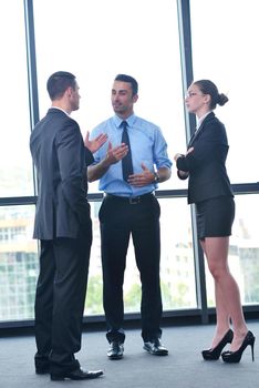 Group of happy young  business people in a meeting at office