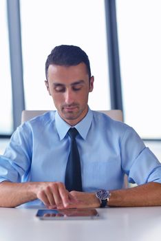 close-up of human hand  business man using tablet compuer at office