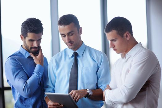 Group of happy young  business people in a meeting at office