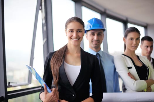 Group of happy young  business people in a meeting at office