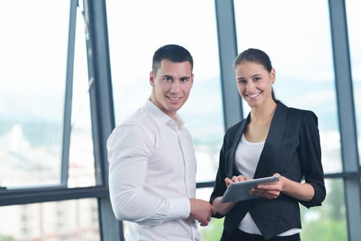 Group of happy young  business people in a meeting at office