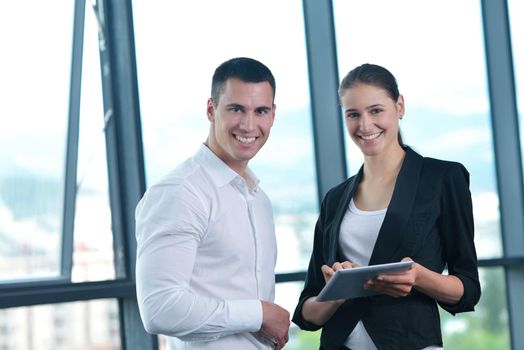 Group of happy young  business people in a meeting at office