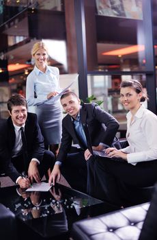 Group of happy young  business people in a meeting at office