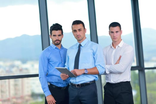 Group of happy young  business people in a meeting at office