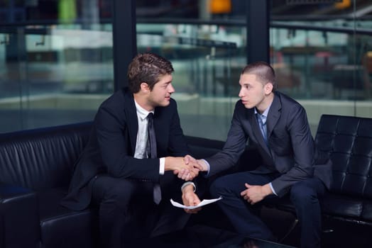 business people shaking hands make deal and sign contract