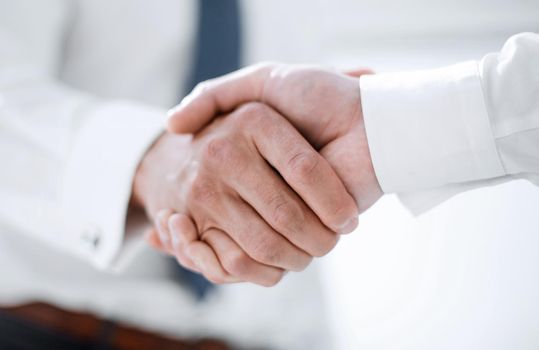 close up.handshake business people. the concept of cooperation