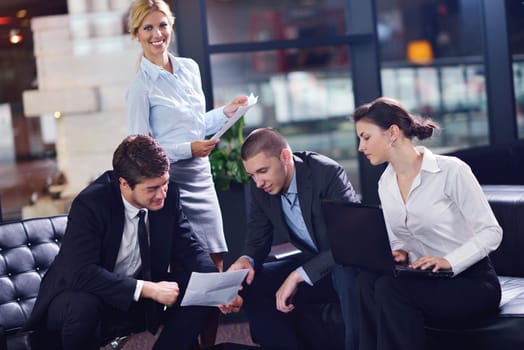 Group of happy young  business people in a meeting at office