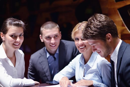 Group of happy young  business people in a meeting at office