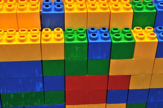 colorful brick toy background in child playground