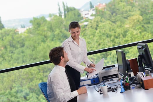 Group of happy young  business people in a meeting at office