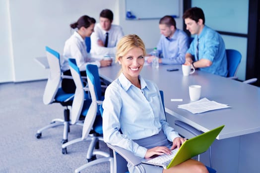 Group of happy young  business people in a meeting at office